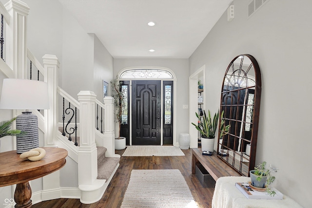 3398 Nottinghill Blvd, Plainfield, IN 46168 - foyer with wood finished floors, stairs, recessed lighting, and baseboards