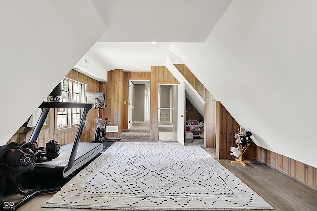 3398 Nottinghill Blvd, Plainfield, IN 46168 - exercise room with wooden walls and wood finished floors