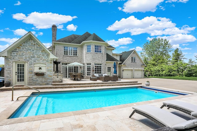 3398 Nottinghill Blvd, Plainfield, IN 46168 - outdoor pool with an outdoor living space and a patio