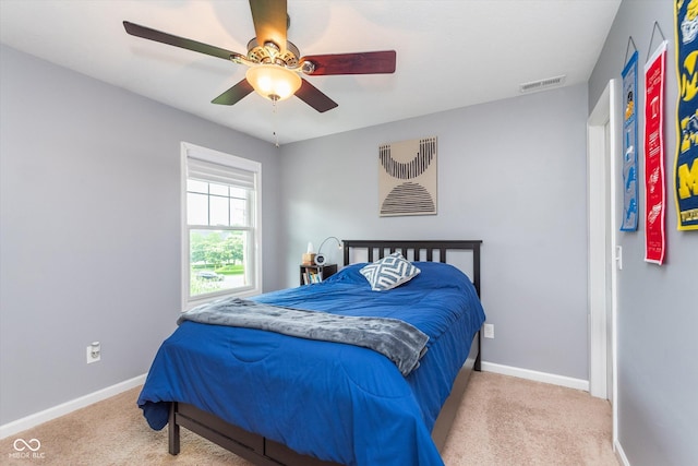 2436 Gwinnett St, Carmel, IN 46032 - carpeted bedroom with baseboards and ceiling fan
