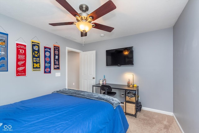 2436 Gwinnett St, Carmel, IN 46032 - bedroom with carpet, a ceiling fan, and baseboards