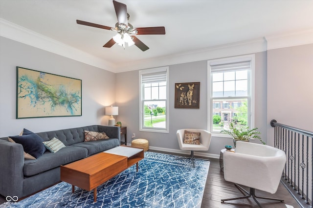 2436 Gwinnett St, Carmel, IN 46032 - living area featuring wood finished floors, ornamental molding, a ceiling fan, and baseboards