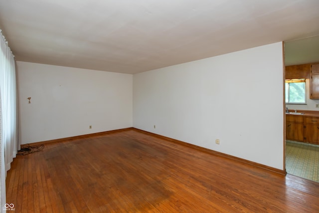 6498 N County Road 475 E, Pittsboro, IN 46167 - empty room with hardwood / wood-style floors and baseboards