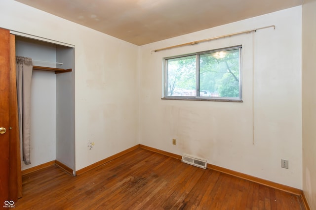 6498 N County Road 475 E, Pittsboro, IN 46167 - unfurnished bedroom featuring wood-type flooring, baseboards, and a closet