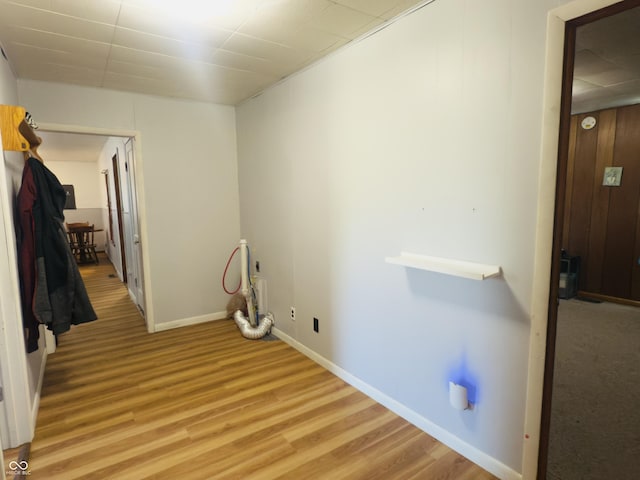 3385 W Commerce St, Vallonia, IN 47281 - laundry room with light wood-style floors and baseboards