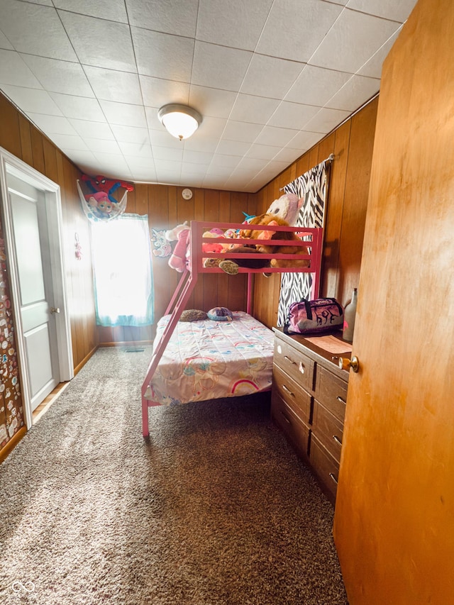 3385 W Commerce St, Vallonia, IN 47281 - carpeted bedroom featuring wooden walls