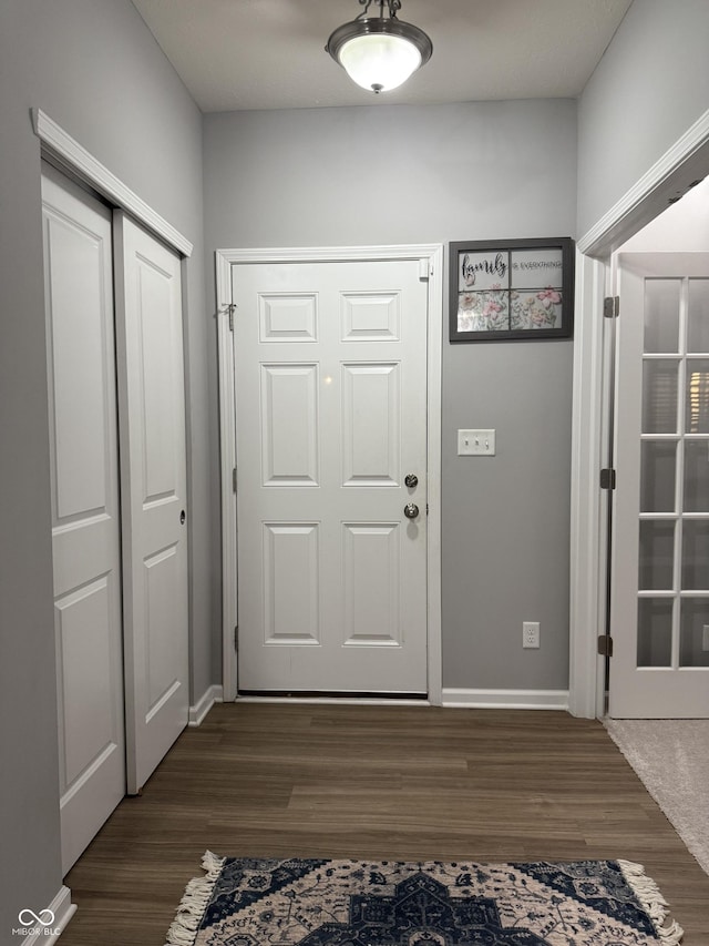 8241 Morera Ct, Indianapolis, IN 46237 - entrance foyer featuring dark wood-type flooring and baseboards