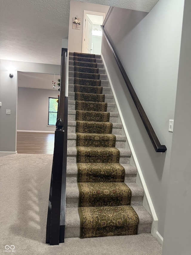 8241 Morera Ct, Indianapolis, IN 46237 - stairs with carpet flooring and baseboards
