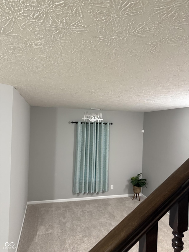 8241 Morera Ct, Indianapolis, IN 46237 - hall with a textured ceiling and carpet