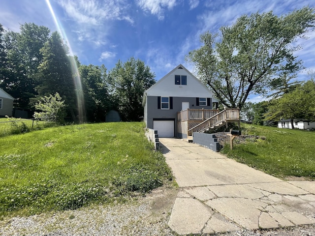2911 E 35th St, Indianapolis, IN 46218 - view of front of property with stairway, concrete driveway, and an attached garage