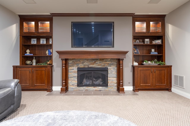 876 Box Turtle Ct, Columbus, IN 47201 - living area featuring carpet floors, a fireplace, and baseboards