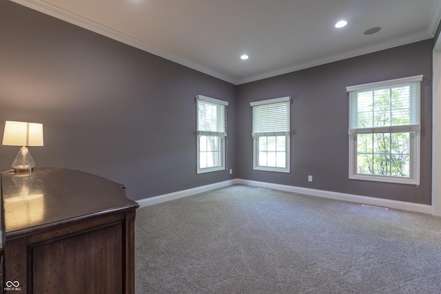 876 Box Turtle Ct, Columbus, IN 47201 - empty room featuring baseboards, ornamental molding, light carpet, healthy amount of natural light, and recessed lighting