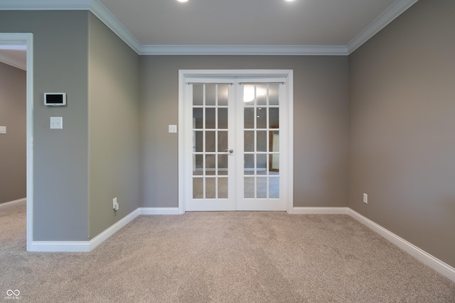 876 Box Turtle Ct, Columbus, IN 47201 - carpeted empty room featuring french doors, crown molding, and baseboards