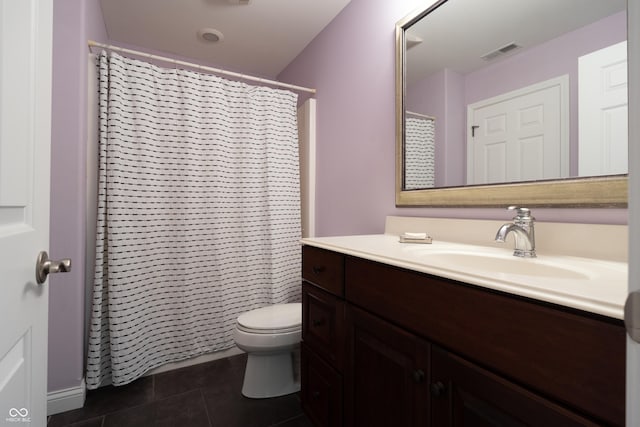 876 Box Turtle Ct, Columbus, IN 47201 - bathroom featuring vanity, toilet, tile patterned flooring, and a shower with shower curtain