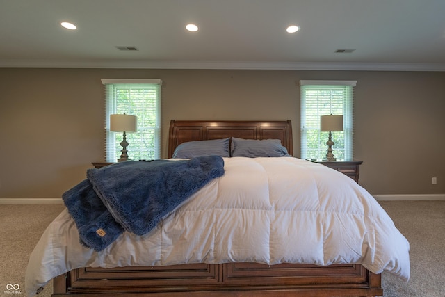 876 Box Turtle Ct, Columbus, IN 47201 - carpeted bedroom featuring baseboards, crown molding, multiple windows, and recessed lighting