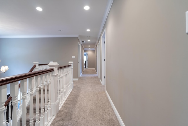 876 Box Turtle Ct, Columbus, IN 47201 - hallway featuring light colored carpet, recessed lighting, crown molding, baseboards, and an upstairs landing