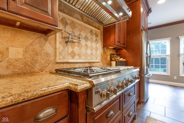 876 Box Turtle Ct, Columbus, IN 47201 - kitchen featuring custom range hood, stainless steel appliances, backsplash, light stone counters, and ornamental molding