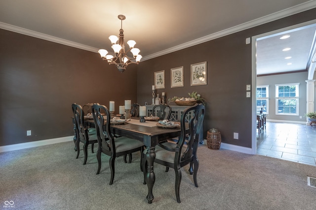 876 Box Turtle Ct, Columbus, IN 47201 - dining area featuring a chandelier, carpet, crown molding, and baseboards