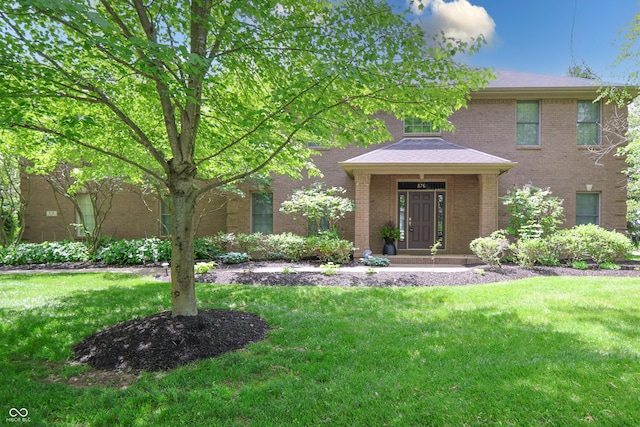 876 Box Turtle Ct, Columbus, IN 47201 - view of front of home featuring a front lawn and brick siding