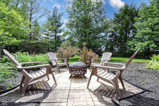 876 Box Turtle Ct, Columbus, IN 47201 - view of patio / terrace featuring an outdoor fire pit