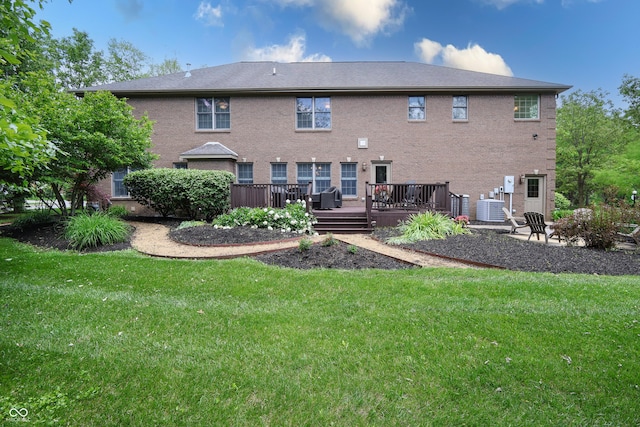 876 Box Turtle Ct, Columbus, IN 47201 - rear view of house featuring a yard, a deck, and central AC