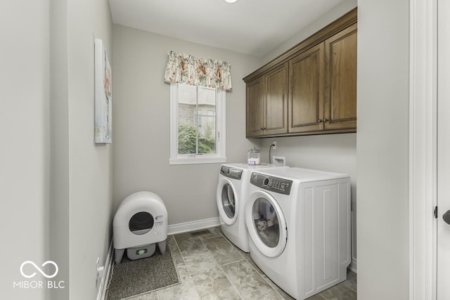 7648 Killarney Dr, Indianapolis, IN 46217 - laundry room with washer and dryer, baseboards, and cabinet space