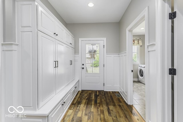 7648 Killarney Dr, Indianapolis, IN 46217 - mudroom featuring washer / clothes dryer, dark wood-type flooring, wainscoting, and recessed lighting