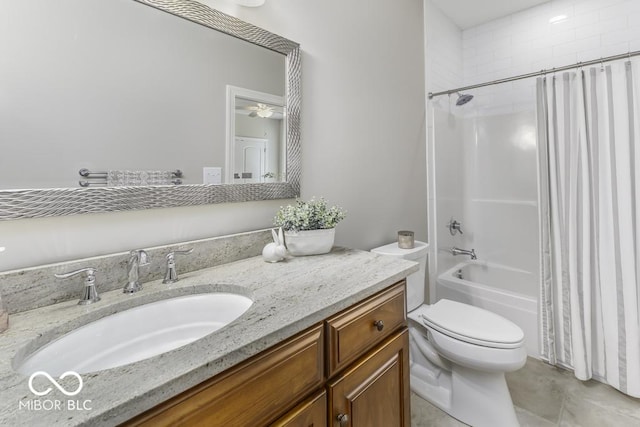7648 Killarney Dr, Indianapolis, IN 46217 - bathroom featuring vanity, toilet, shower / tub combo, and a ceiling fan