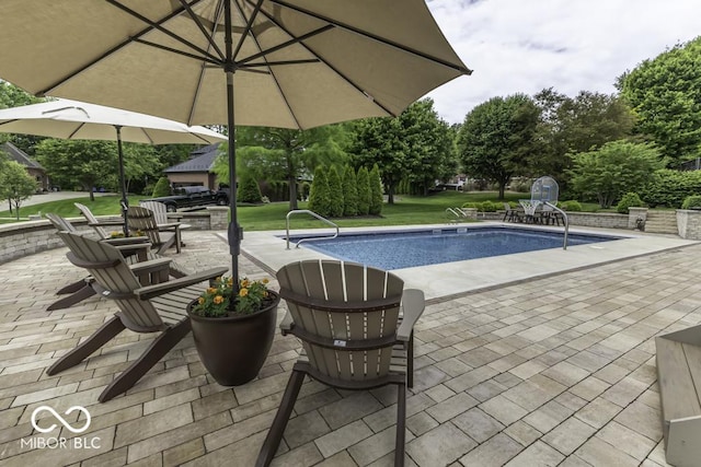 7648 Killarney Dr, Indianapolis, IN 46217 - outdoor pool featuring a patio and a yard