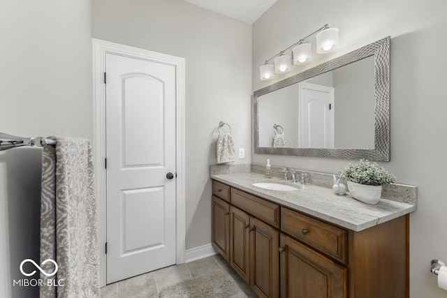 7648 Killarney Dr, Indianapolis, IN 46217 - bathroom with vanity and baseboards