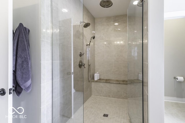 7648 Killarney Dr, Indianapolis, IN 46217 - full bathroom with a shower stall and baseboards