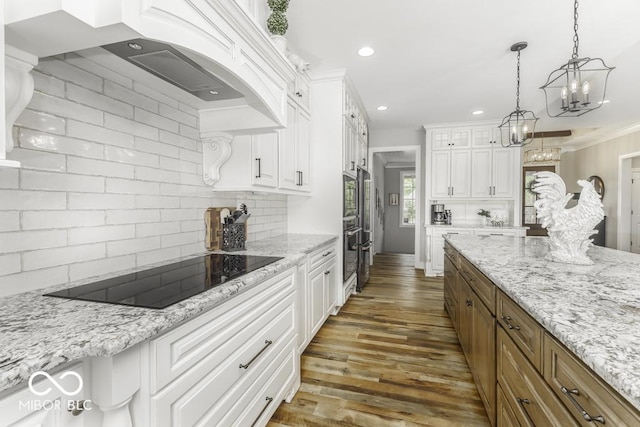 7648 Killarney Dr, Indianapolis, IN 46217 - kitchen featuring black electric cooktop, decorative backsplash, white cabinetry, recessed lighting, and dark wood finished floors