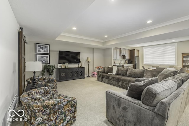 7648 Killarney Dr, Indianapolis, IN 46217 - living area with light carpet, recessed lighting, crown molding, a tray ceiling, and a barn door