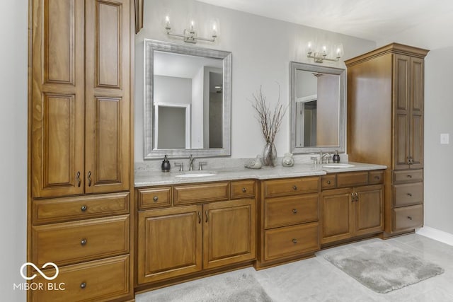 7648 Killarney Dr, Indianapolis, IN 46217 - bathroom featuring double vanity, a chandelier, and tile patterned floors