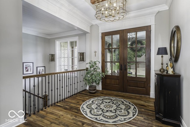 7648 Killarney Dr, Indianapolis, IN 46217 - foyer entrance featuring wood finished floors, a chandelier, french doors, and crown molding