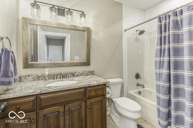 7648 Killarney Dr, Indianapolis, IN 46217 - bathroom featuring toilet, vanity, and shower / tub combo