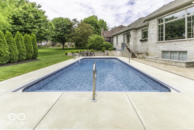 7648 Killarney Dr, Indianapolis, IN 46217 - swimming pool featuring a yard and a patio
