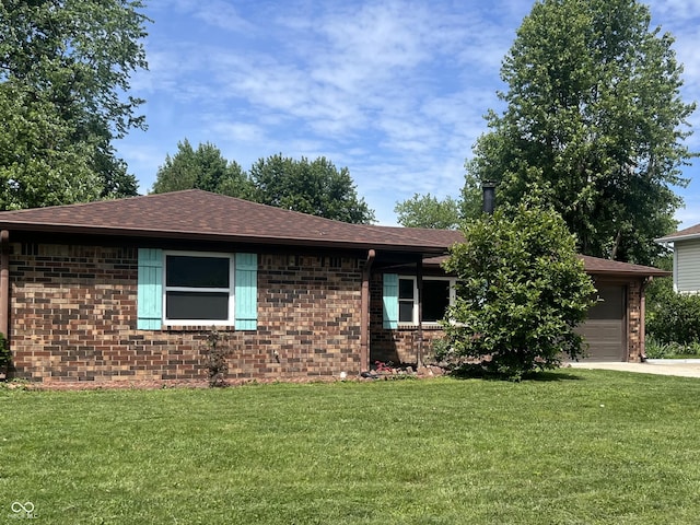 7824 Hearthstone Way, Indianapolis, IN 46227 - view of front of property featuring brick siding, an attached garage, and a front lawn