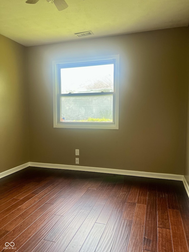 7824 Hearthstone Way, Indianapolis, IN 46227 - unfurnished room with dark wood-style floors, baseboards, and ceiling fan