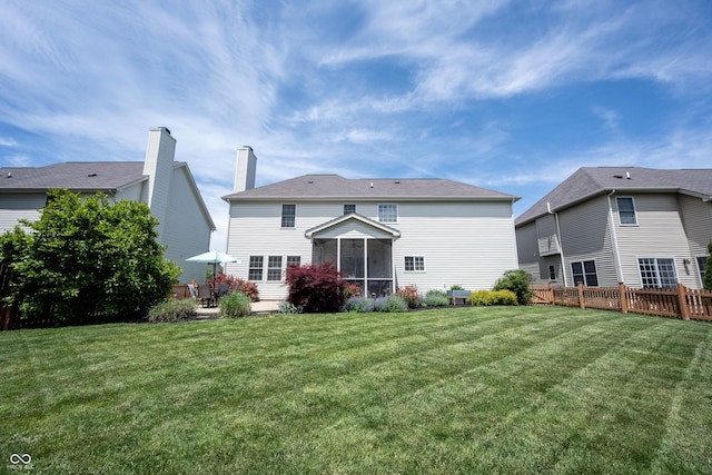 12093 Ashland Dr, Fishers, IN 46037 - back of property with a sunroom and a chimney