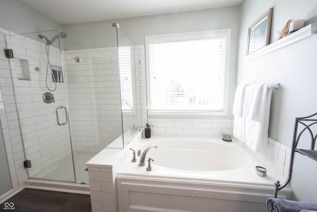 12093 Ashland Dr, Fishers, IN 46037 - bathroom featuring a garden tub and a shower stall