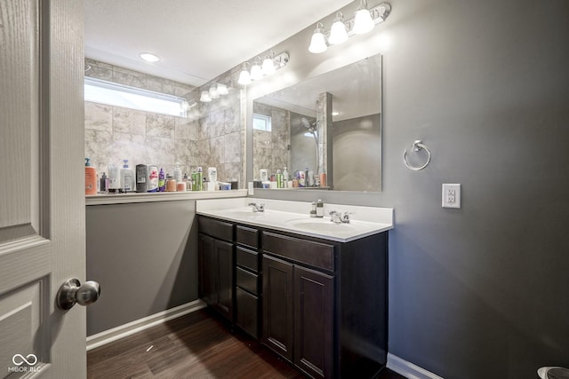 5374 John Quincy Adams Ct, Plainfield, IN 46168 - full bathroom featuring double vanity and wood finished floors