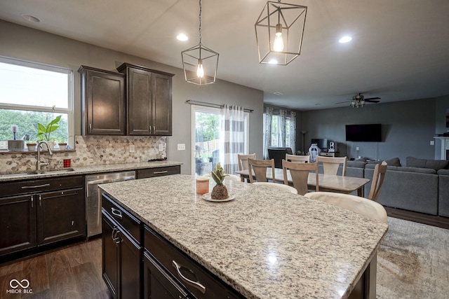 5374 John Quincy Adams Ct, Plainfield, IN 46168 - kitchen featuring a sink, dishwasher, dark wood finished floors, dark brown cabinetry, and ceiling fan