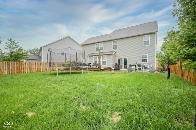 5374 John Quincy Adams Ct, Plainfield, IN 46168 - rear view of property with a trampoline and a deck