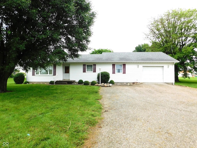5698 N State Road 3, Greensburg, IN 47240 - ranch-style home with an attached garage, driveway, and a front lawn
