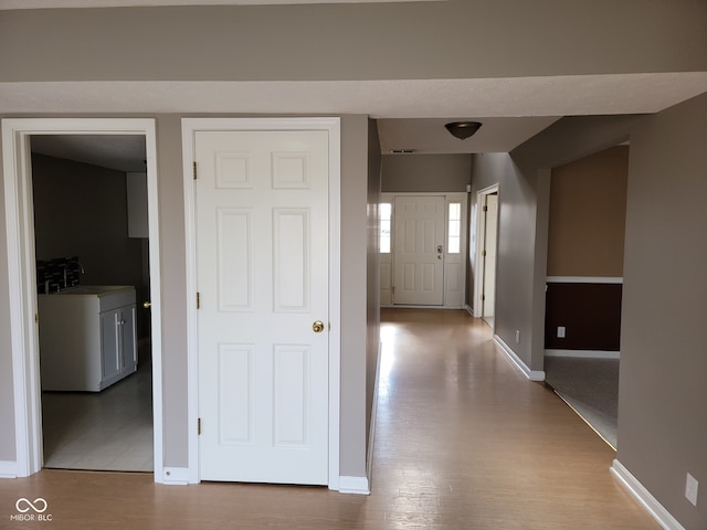 11754 Hamble Dr, Indianapolis, IN 46235 - hallway with wood finished floors and a sink