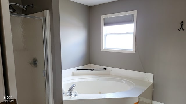 11754 Hamble Dr, Indianapolis, IN 46235 - full bathroom featuring a shower stall and a jetted tub