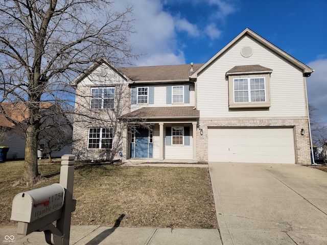 11754 Hamble Dr, Indianapolis, IN 46235 - traditional home with an attached garage, brick siding, driveway, and a shingled roof