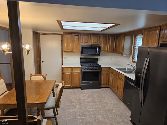 1805 River Run Trl, Fort Wayne, IN 46825 - kitchen featuring stainless steel fridge with ice dispenser, range with gas stovetop, a sink, black dishwasher, and light countertops