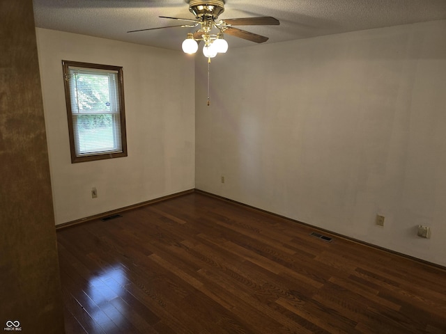 1805 River Run Trl, Fort Wayne, IN 46825 - unfurnished room featuring dark wood-type flooring, a ceiling fan, baseboards, and a textured ceiling